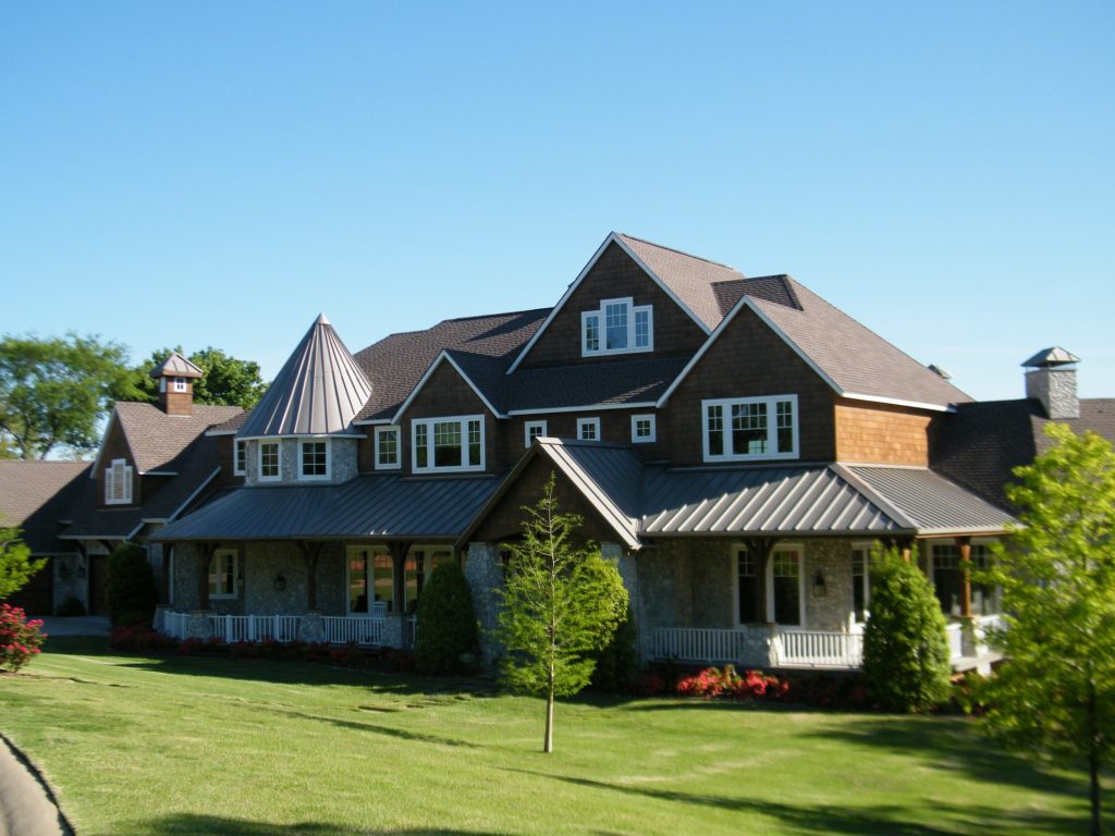 large home with metal roofing