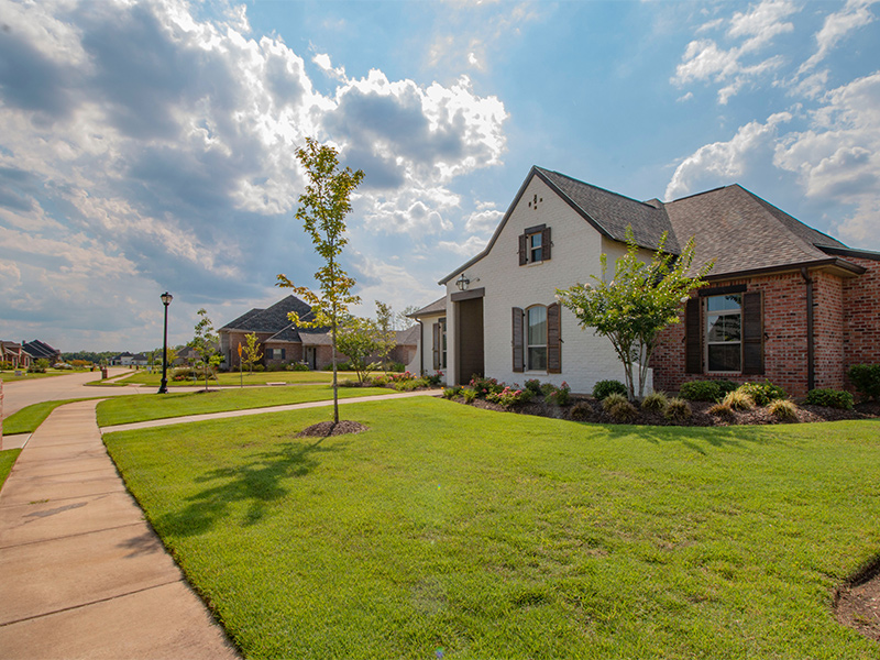 white home with asphalt shingles 