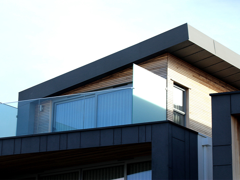 modern home with custom roofing and siding