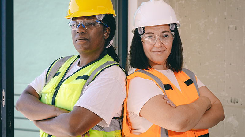 two roof repair technicians ready to work